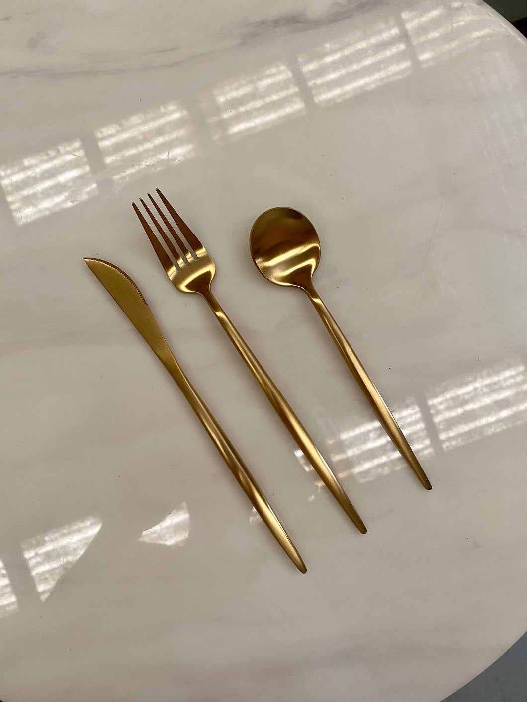 Slim gold cutlery